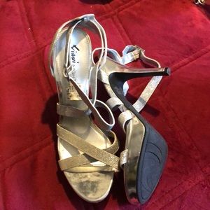 Silver strapped High heel shoes